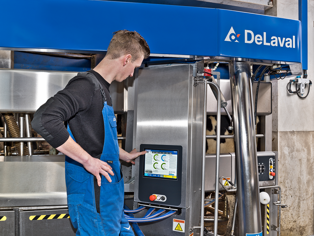 Man operating DeLaval VMS